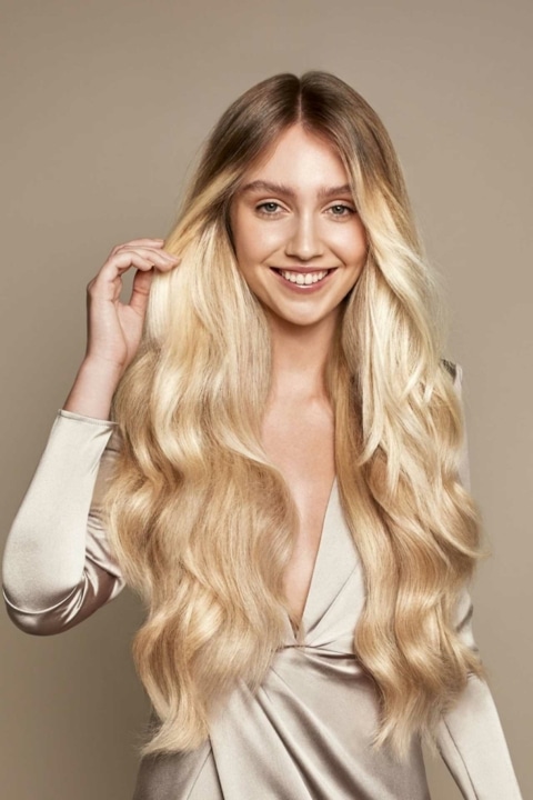 Nachher-Bild einer Haarverlängerung bei einer frau mit blonden Haaren mit Haidreams