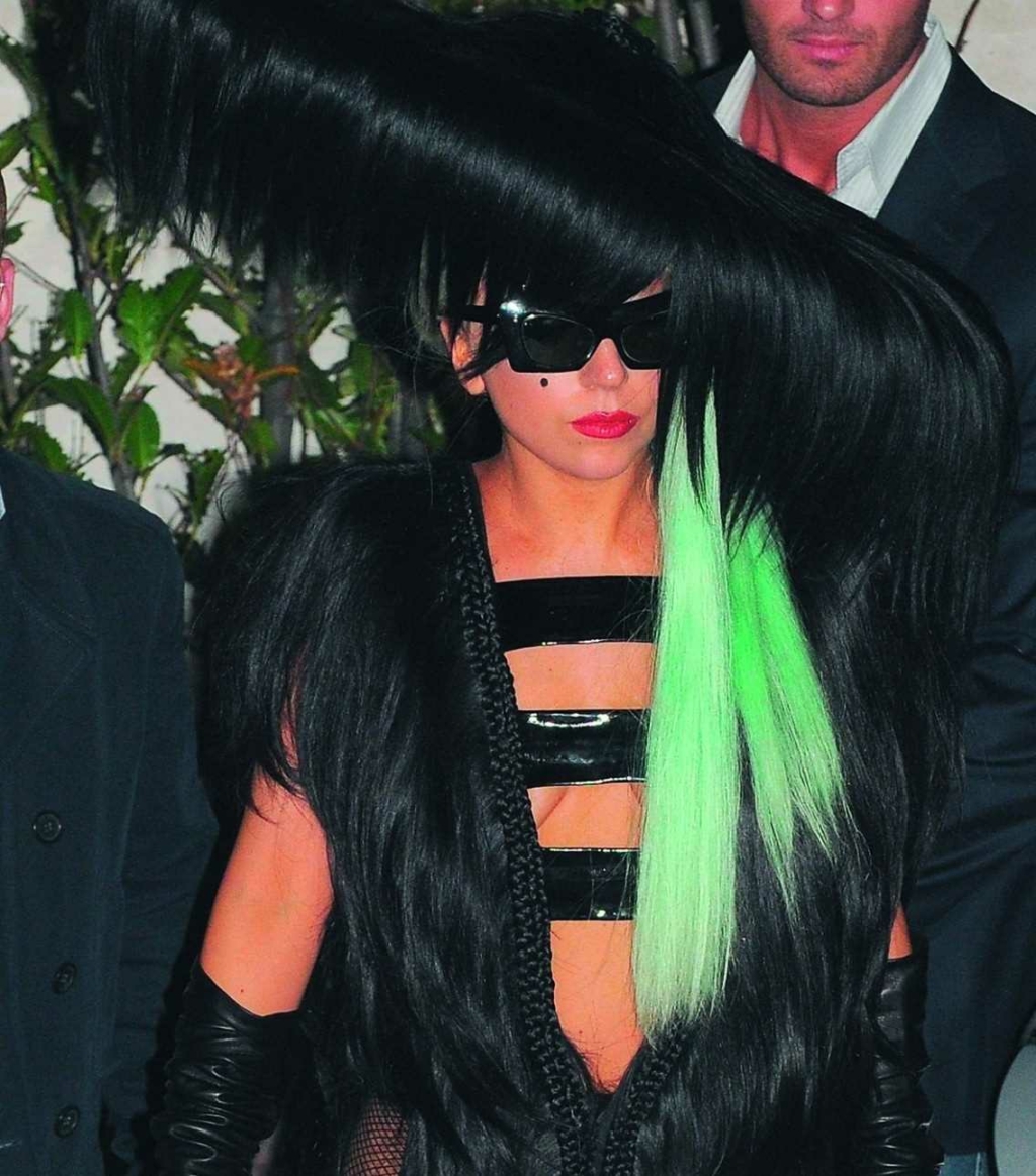 Lady Gaga wears a dress with Hairdreams hair in the colours black and neon green
