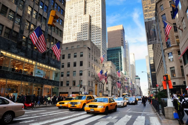 Photo of New York with skyscrapers and yellow taxis